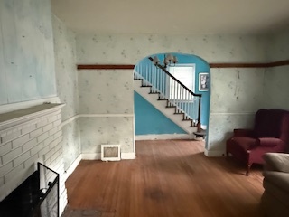 306 Elizabeth Street Calumet City, IL 60409 - Photo 5 of 11 a view of livingroom with furniture and stairs