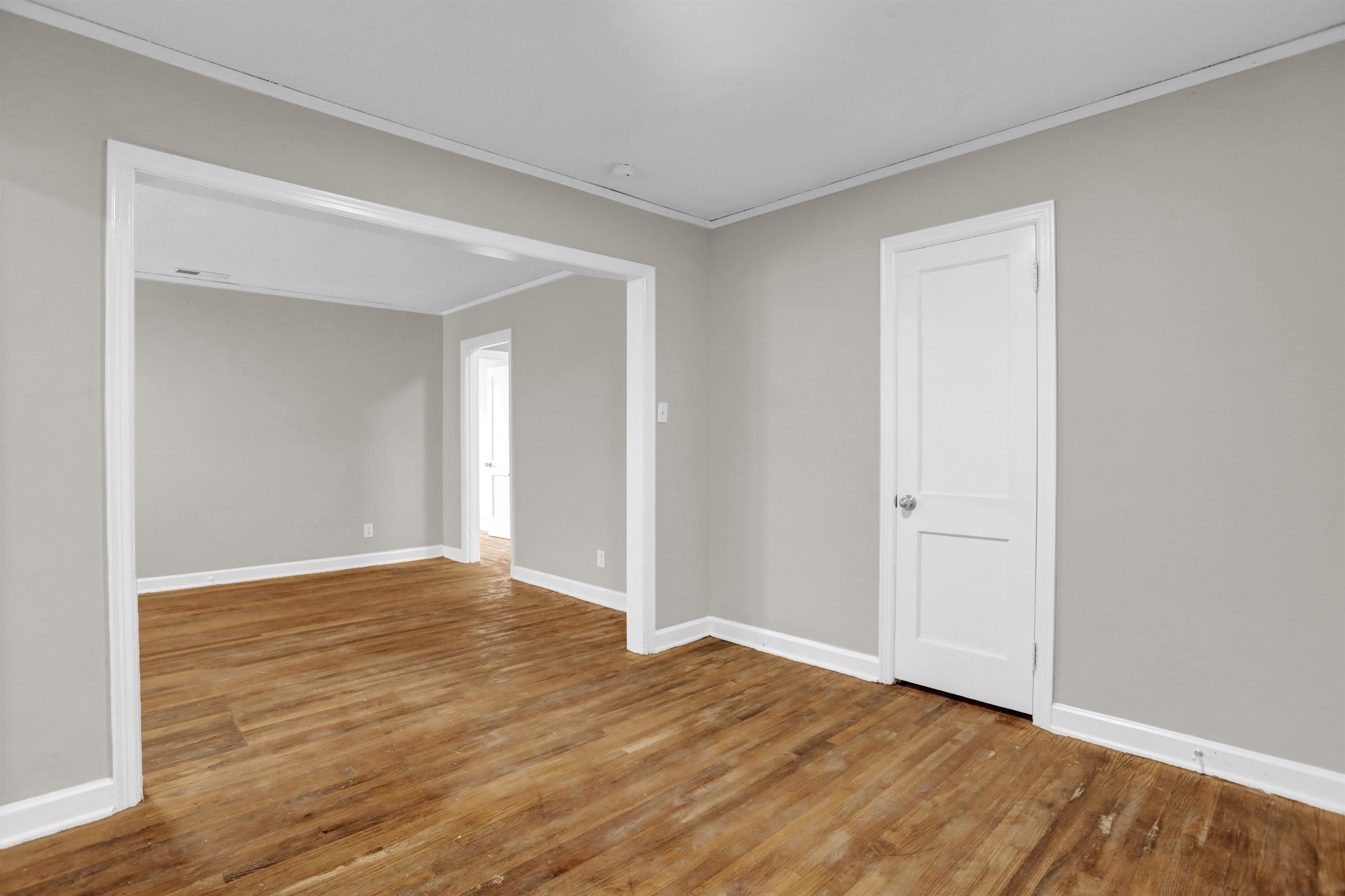 3257 Millington Road Memphis, TN 38127 - Photo 26 of 31 Empty room with crown molding and wood finished floors