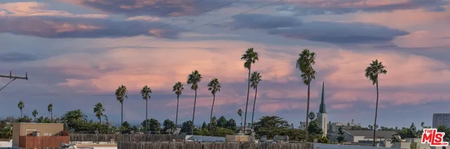 a view of a city with lots of residential buildings in the background