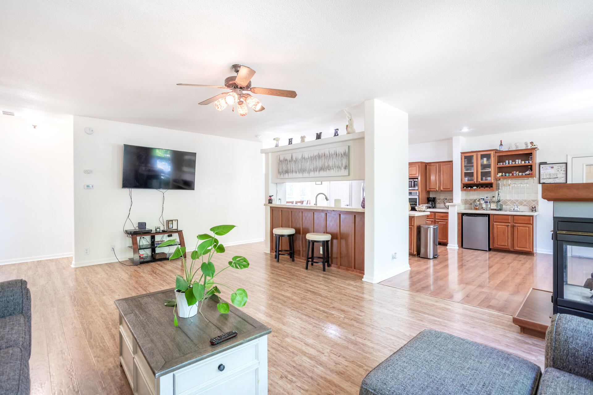 21100 Doe Run Way Red Bluff, CA 96080 - Photo 15 of 93 a living room with stainless steel appliances furniture and a kitchen view