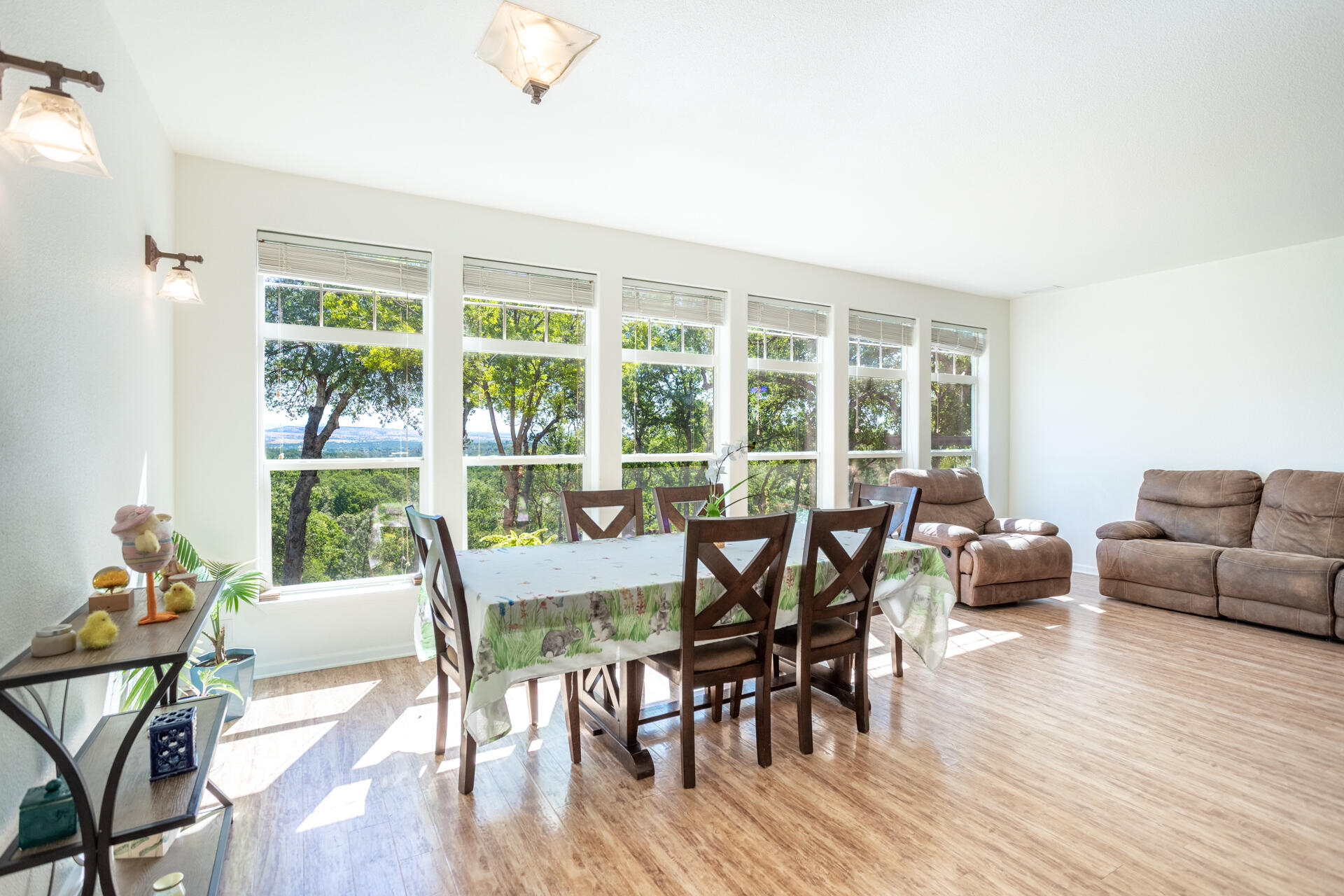 21100 Doe Run Way Red Bluff, CA 96080 - Photo 17 of 93 a view of a dining room with furniture window and wooden floor
