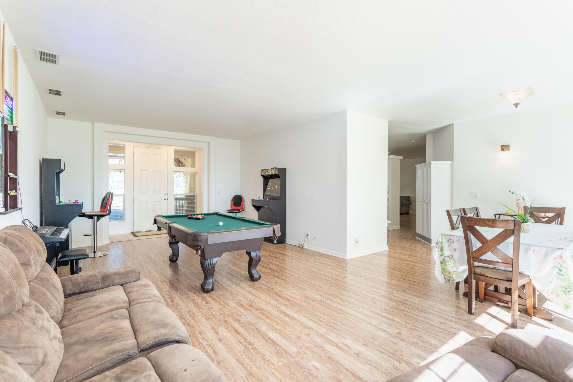 21100 Doe Run Way Red Bluff, CA 96080 - Photo 19 of 93 a living room with furniture and a wooden floor