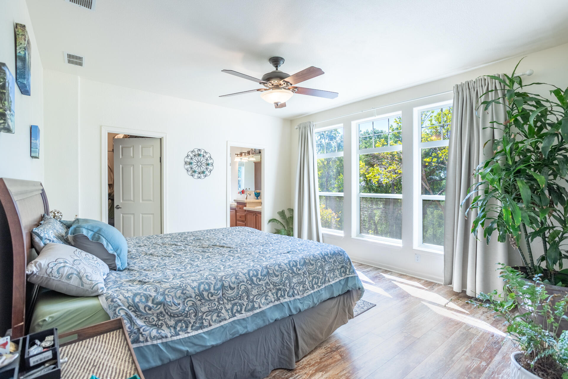 21100 Doe Run Way Red Bluff, CA 96080 - Photo 20 of 93 a bedroom with a bed and a large window