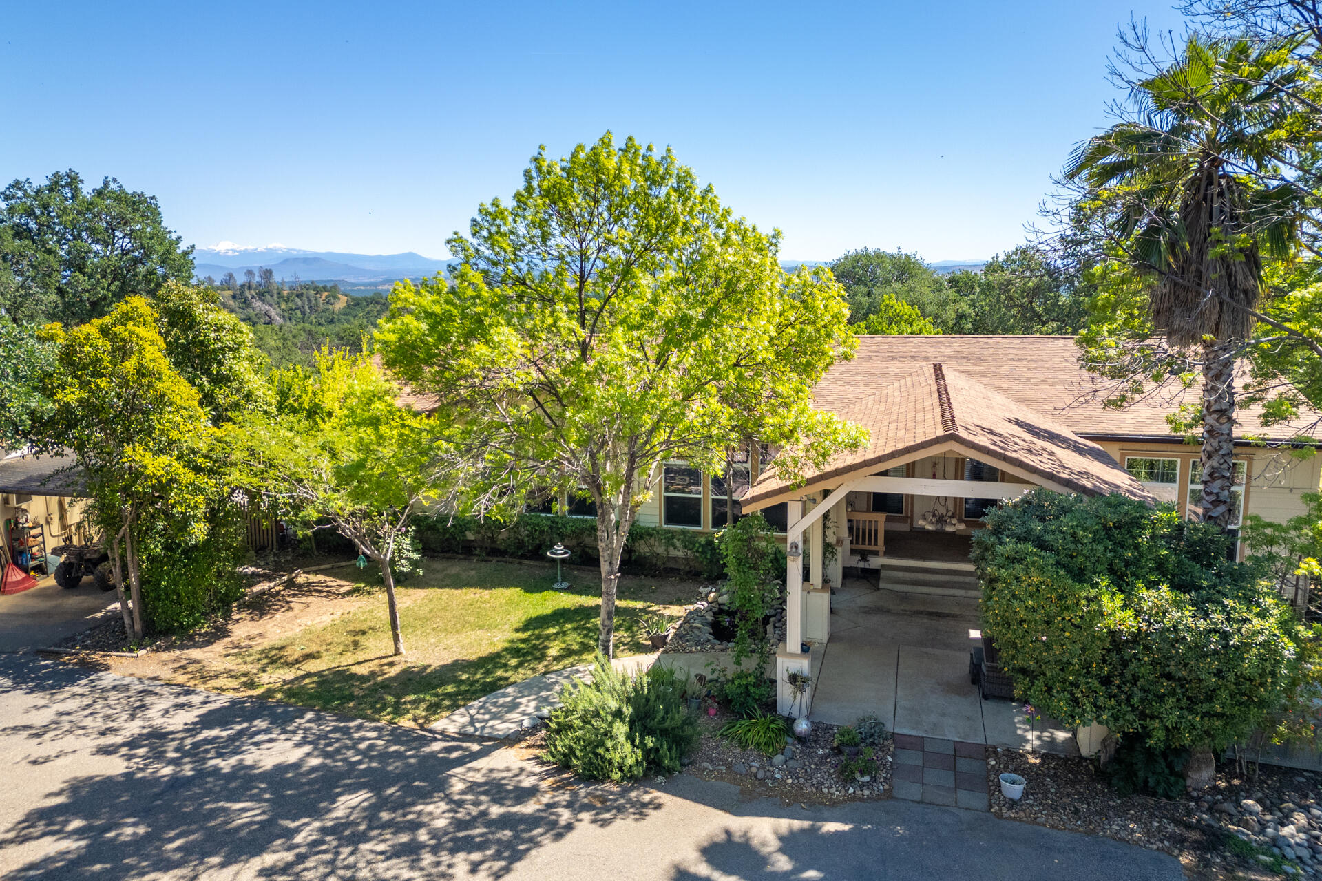 21100 Doe Run Way Red Bluff, CA 96080 - Photo 2 of 93 a house that has a tree in it