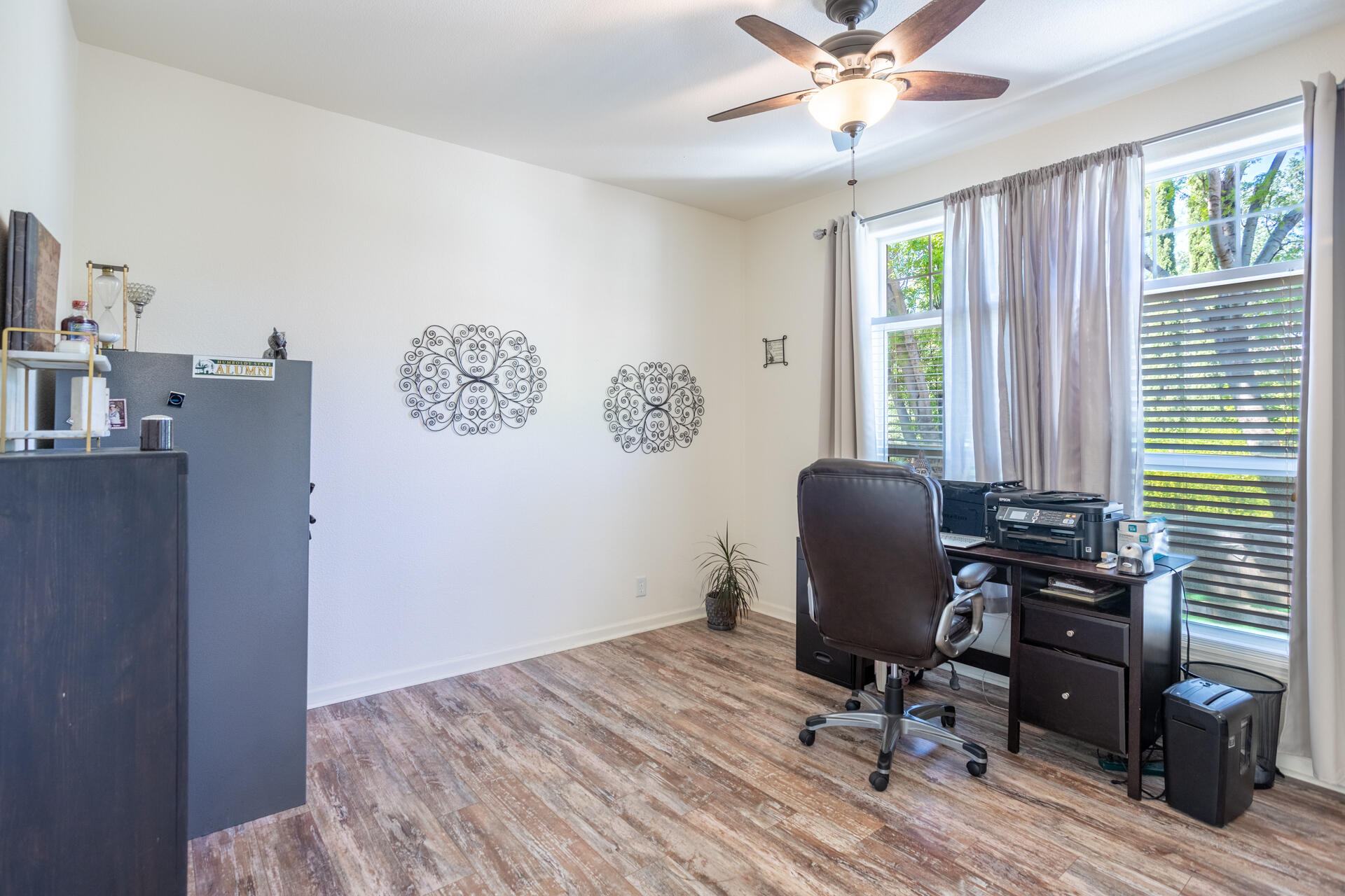 21100 Doe Run Way Red Bluff, CA 96080 - Photo 22 of 93 a view of a workspace with furniture and a window
