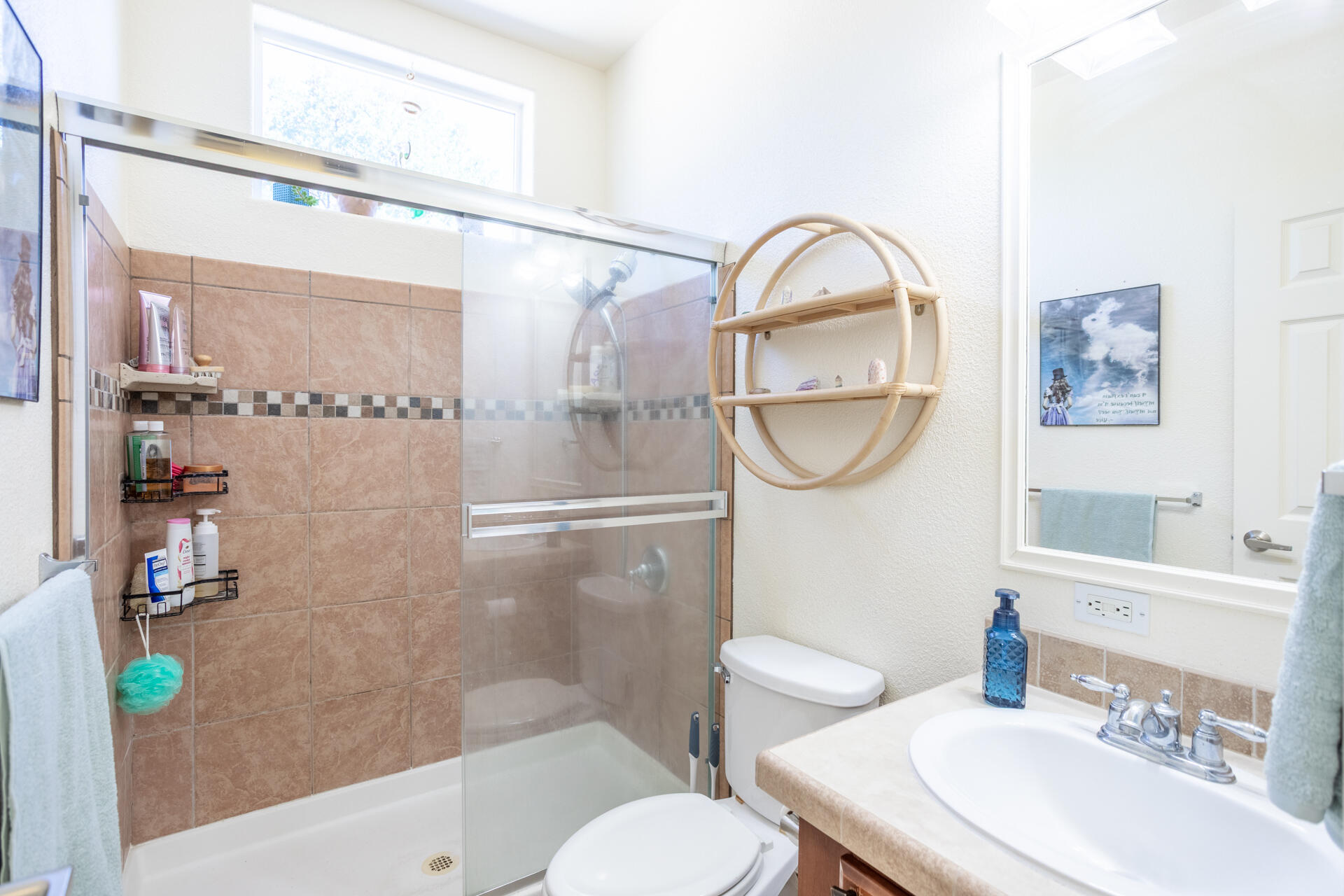 21100 Doe Run Way Red Bluff, CA 96080 - Photo 28 of 93 a bathroom with a sink toilet and a shower