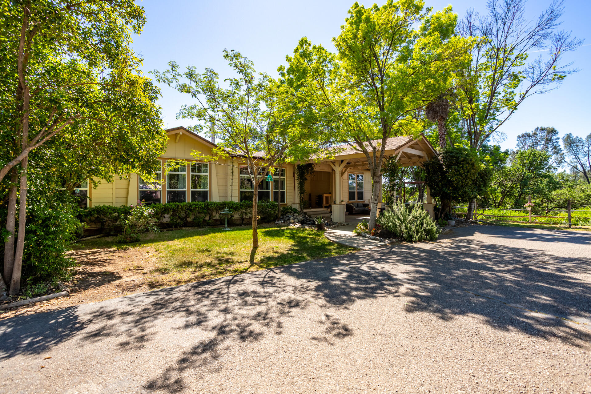 21100 Doe Run Way Red Bluff, CA 96080 - Photo 34 of 93 a view of a house with a yard and tree s