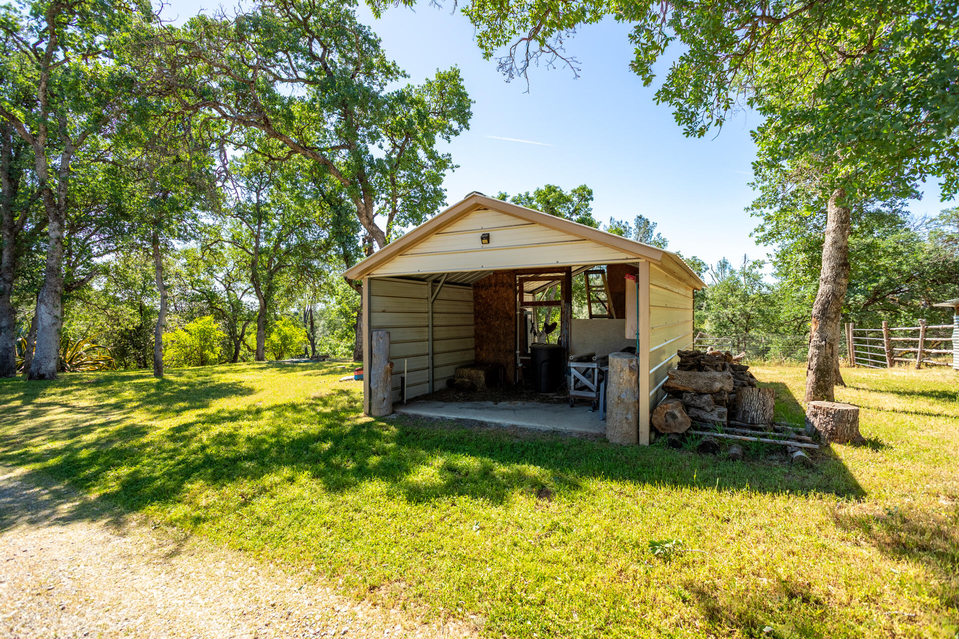 21100 Doe Run Way Red Bluff, CA 96080 - Photo 49 of 93 a front view of a house with a yard