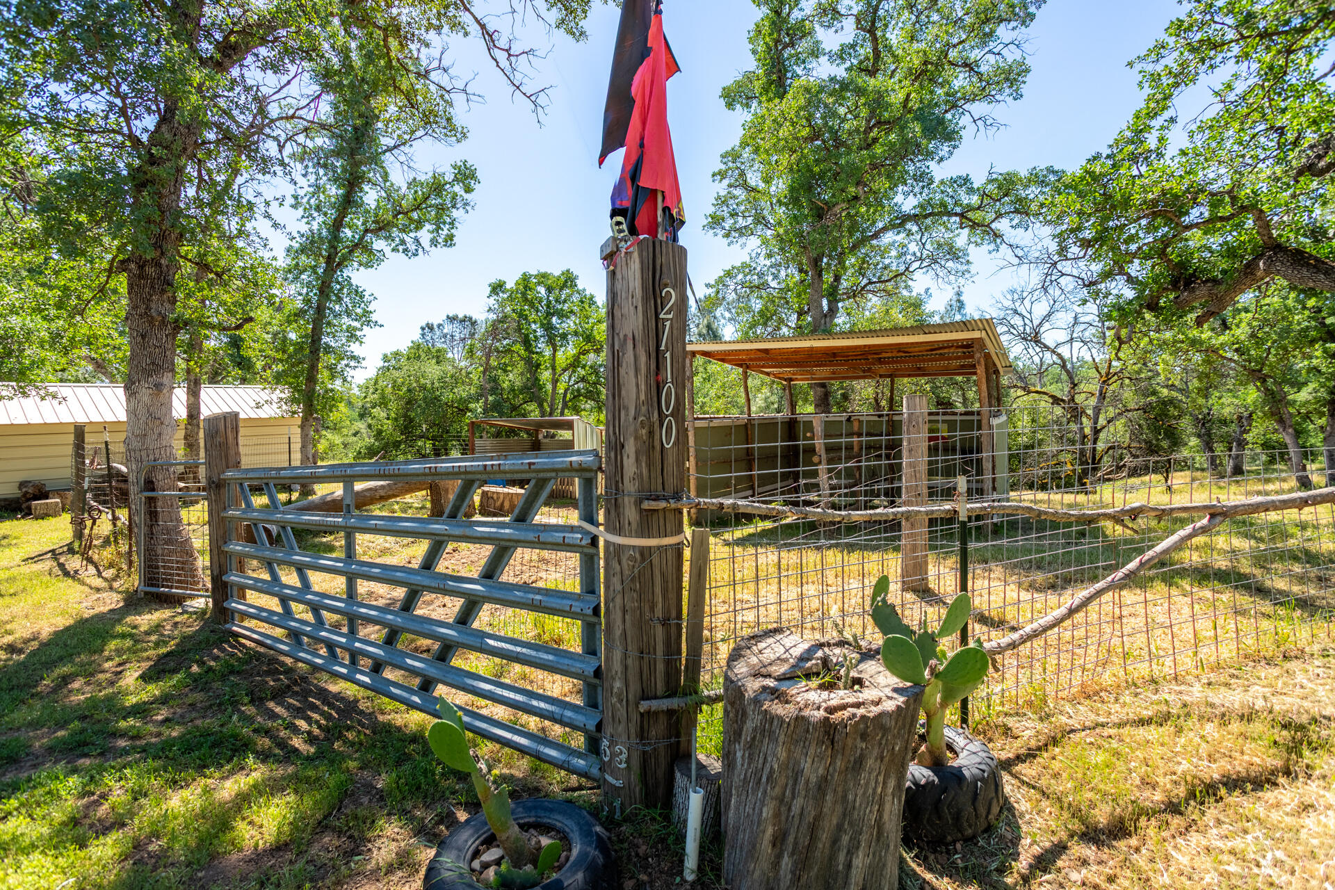 21100 Doe Run Way Red Bluff, CA 96080 - Photo 51 of 93 a view of a swimming pool with a patio and wooden deck