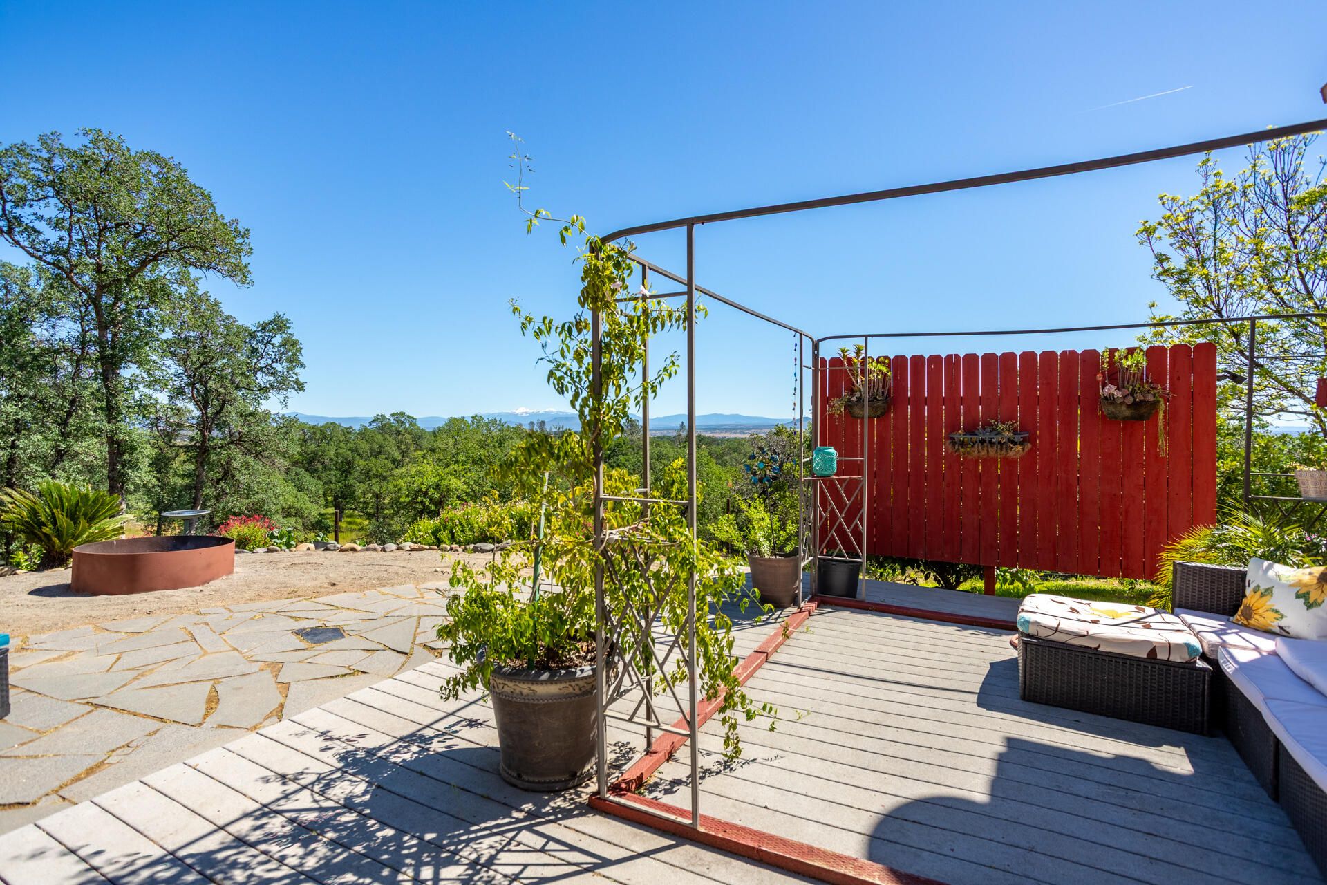 21100 Doe Run Way Red Bluff, CA 96080 - Photo 62 of 93 a view of a backyard with sitting area