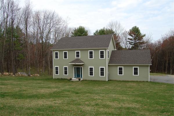 49 Old Gilbertville Road Ware, MA 01082 - Photo 1 of 25 a front view of a house with a garden