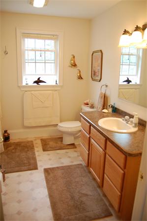 49 Old Gilbertville Road Ware, MA 01082 - Photo 18 of 25 a bathroom with a sink and a mirror