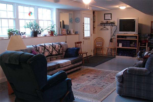 49 Old Gilbertville Road Ware, MA 01082 - Photo 19 of 25 a living room with furniture and a flat screen tv