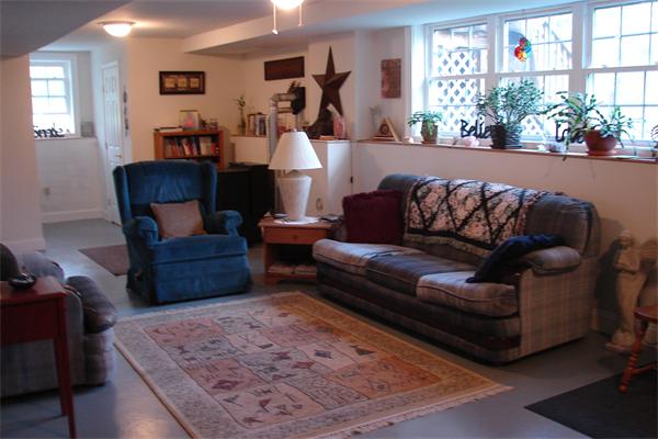 49 Old Gilbertville Road Ware, MA 01082 - Photo 20 of 25 a living room with furniture and a large window