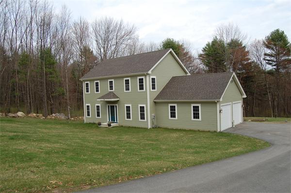 49 Old Gilbertville Road Ware, MA 01082 - Photo 2 of 25 a front view of a house with a garden