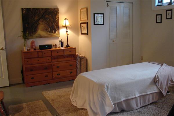 49 Old Gilbertville Road Ware, MA 01082 - Photo 22 of 25 a bedroom with a bed and a flat tv screen on dresser