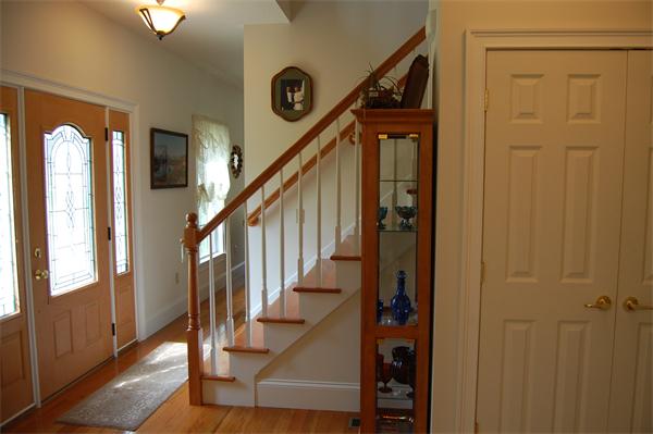 49 Old Gilbertville Road Ware, MA 01082 - Photo 10 of 25 a view of an entryway with wooden floor and door
