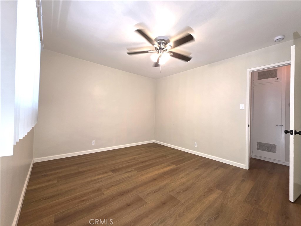 868 Random Lane Duarte, CA 91010 - Photo 14 of 22 a view of an empty room with wooden floor
