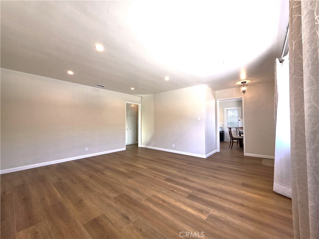 868 Random Lane Duarte, CA 91010 - Photo 6 of 22 a view of empty room with wooden floor