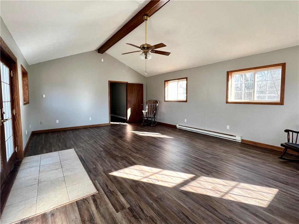 97 Dean Road Sandy Lake, PA 16145 - Photo 2 of 25 wooden floor in an empty room with a window