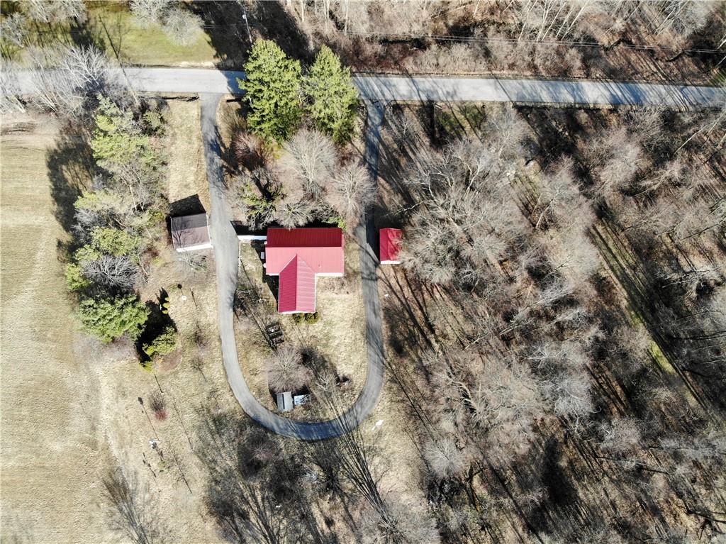 97 Dean Road Sandy Lake, PA 16145 - Photo 25 of 25 an aerial view of a house with a yard
