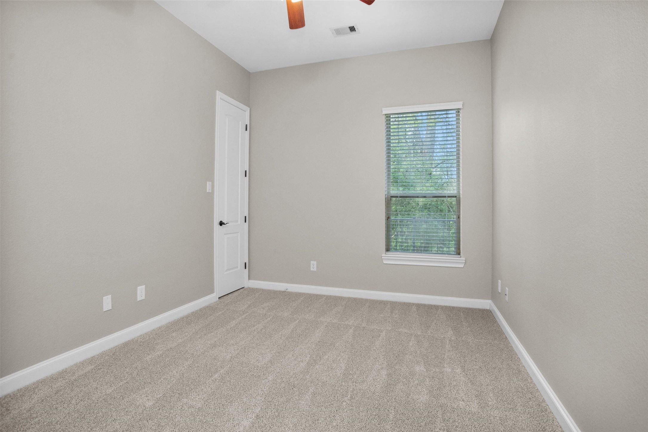 27910 Hansons Court Spring, TX 77386 - Photo 21 of 50 Second bedroom with new carpet and pad, fresh paint and a very spacious walk-in closet
