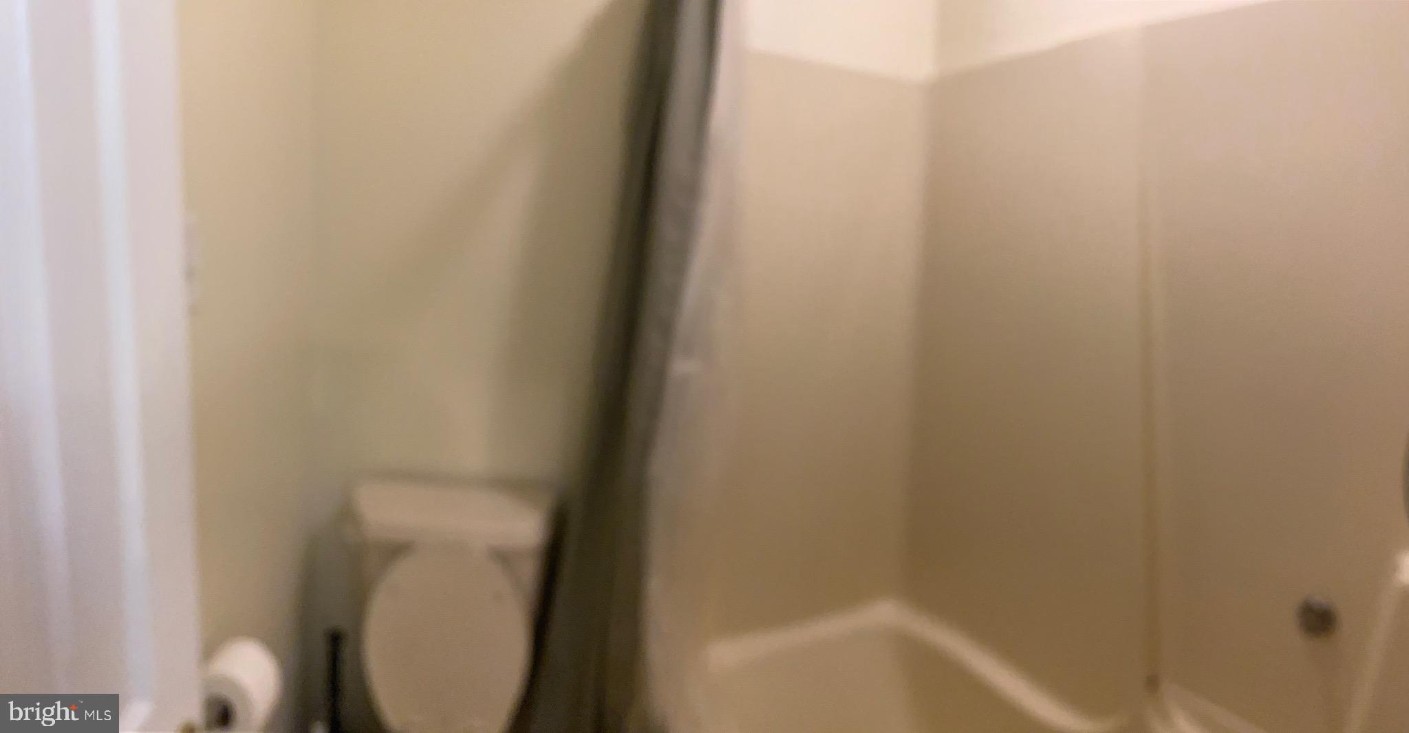 1216 Heathfield Road Eldersburg, MD 21784 - Photo 11 of 26 a bathroom with a bathtub