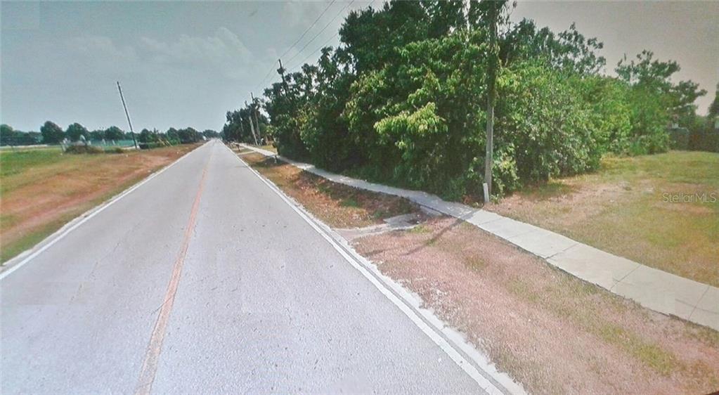 0 West Crown Point Road Winter Garden, FL 34787 - Photo 1 of 1 Beautiful 150' frontage of wooded lot seen on the right side of this picture with a water view in the front (see additional photos)