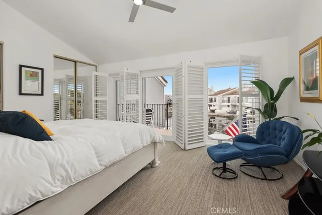 a bedroom with a bed and dresser