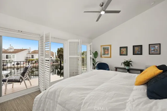 a bedroom with furniture and a fireplace