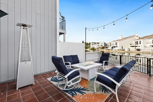 a living room with patio furniture