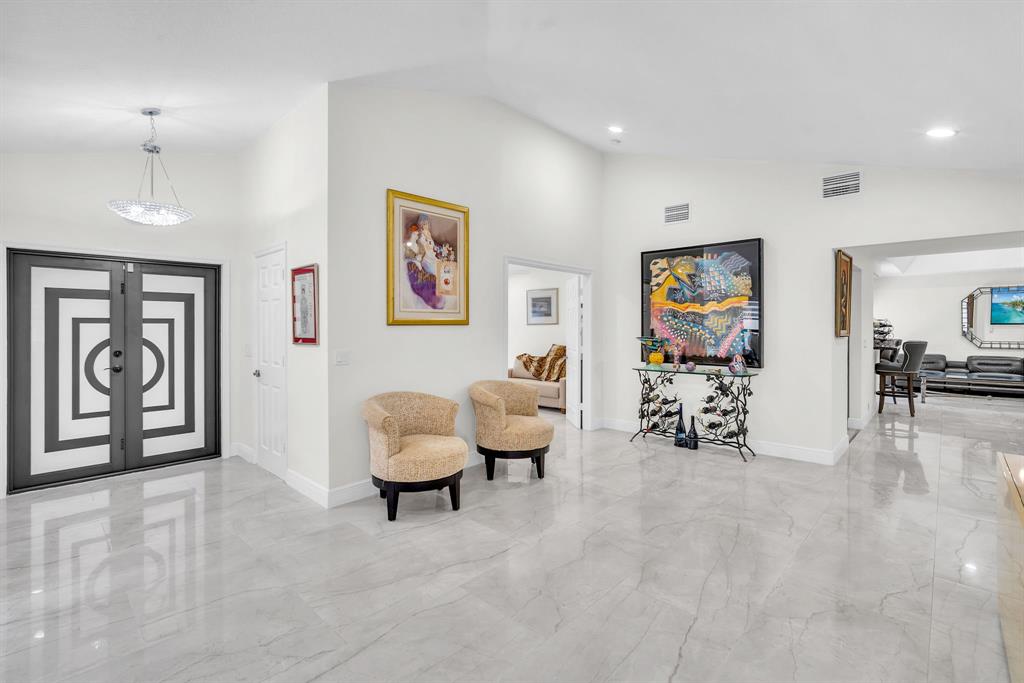 820 Southwest 87th Terrace Plantation, FL 33324 - Photo 2 of 41 a living room with furniture and large window