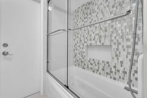 a view of a backyard with a slide and a table and chairs