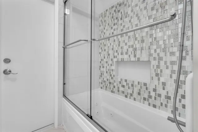 a view of a backyard with a slide and a table and chairs