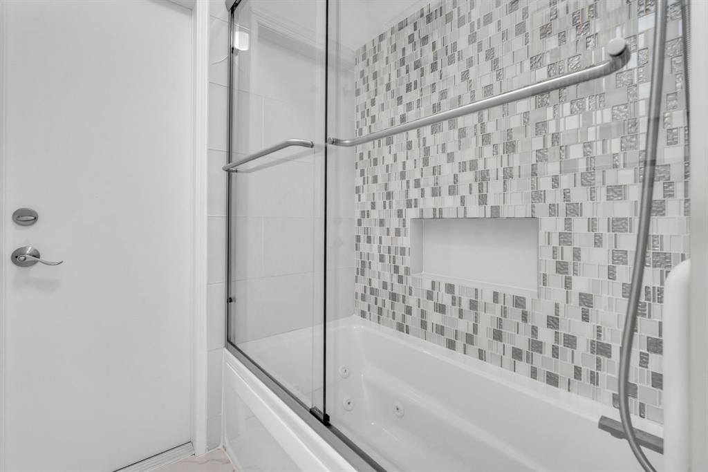 820 Southwest 87th Terrace Plantation, FL 33324 - Photo 33 of 41 a bathroom with a bathtub and shower