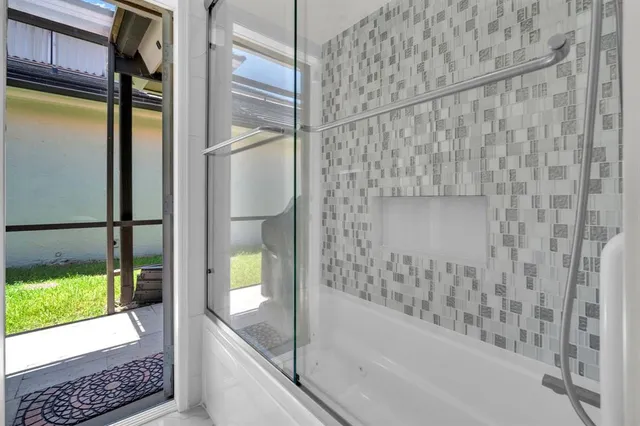 a view of a house with a yard and a garden