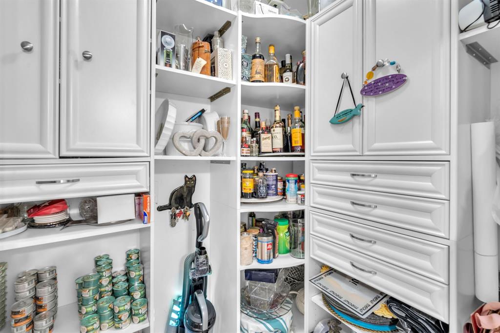 820 Southwest 87th Terrace Plantation, FL 33324 - Photo 5 of 41 a view of walk in closet with clothes and shoes