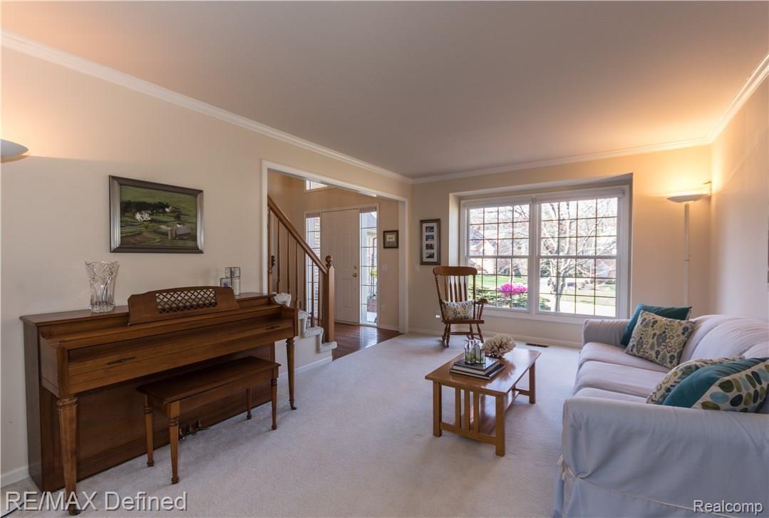 3819 Red Root Road Lake Orion, MI 48360 - Photo 17 of 37 Living Room, Crown Molding, Carpeting