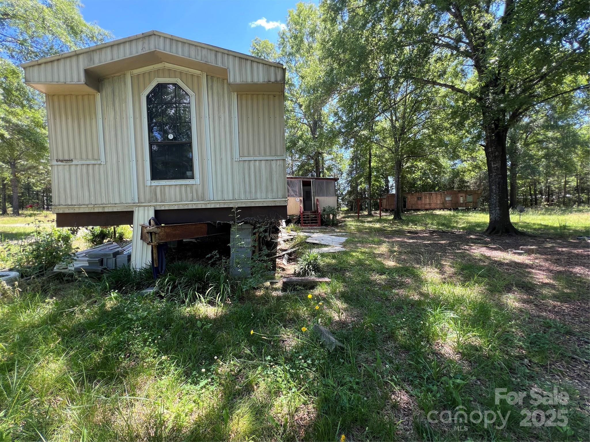 5655 Shirley Road Fort Lawn, SC 29714 - Photo 15 of 23 a front view of a house with a yard