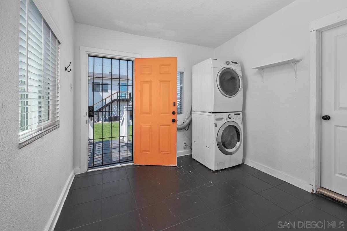 2948 Franklin Avenue San Diego, CA 92113 - Photo 11 of 47 a view of a storage and utility room with washer and dryer