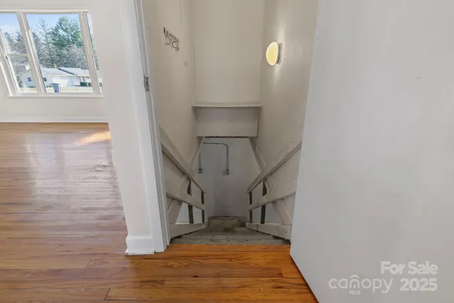 a view of entryway with wooden floor