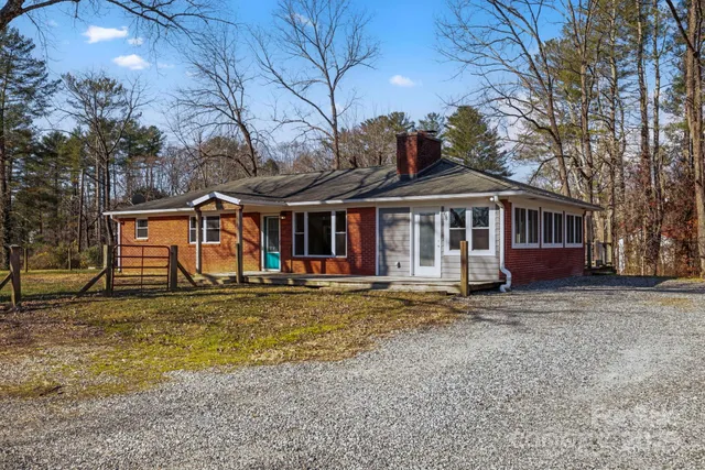 a front view of a house with a porch