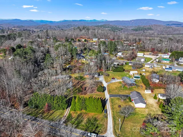 a view of a city with mountains in the background