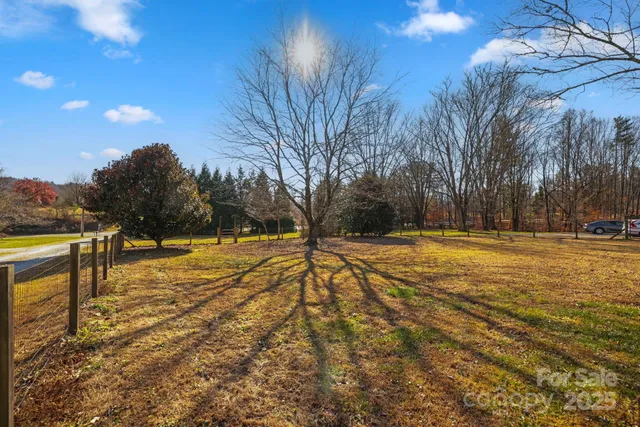 a view of swimming pool with trees