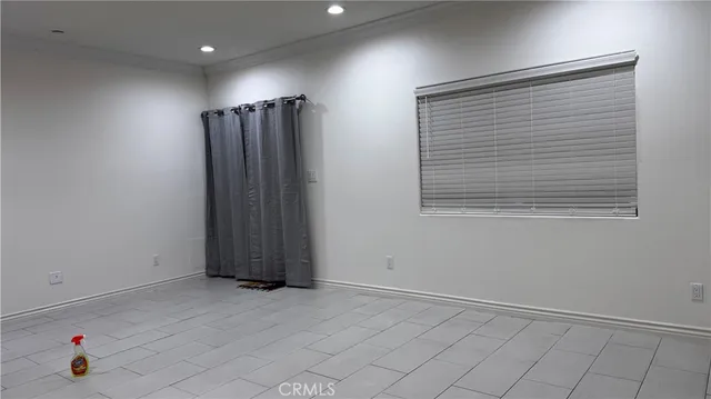 a kitchen with stainless steel appliances a sink stove and cabinets