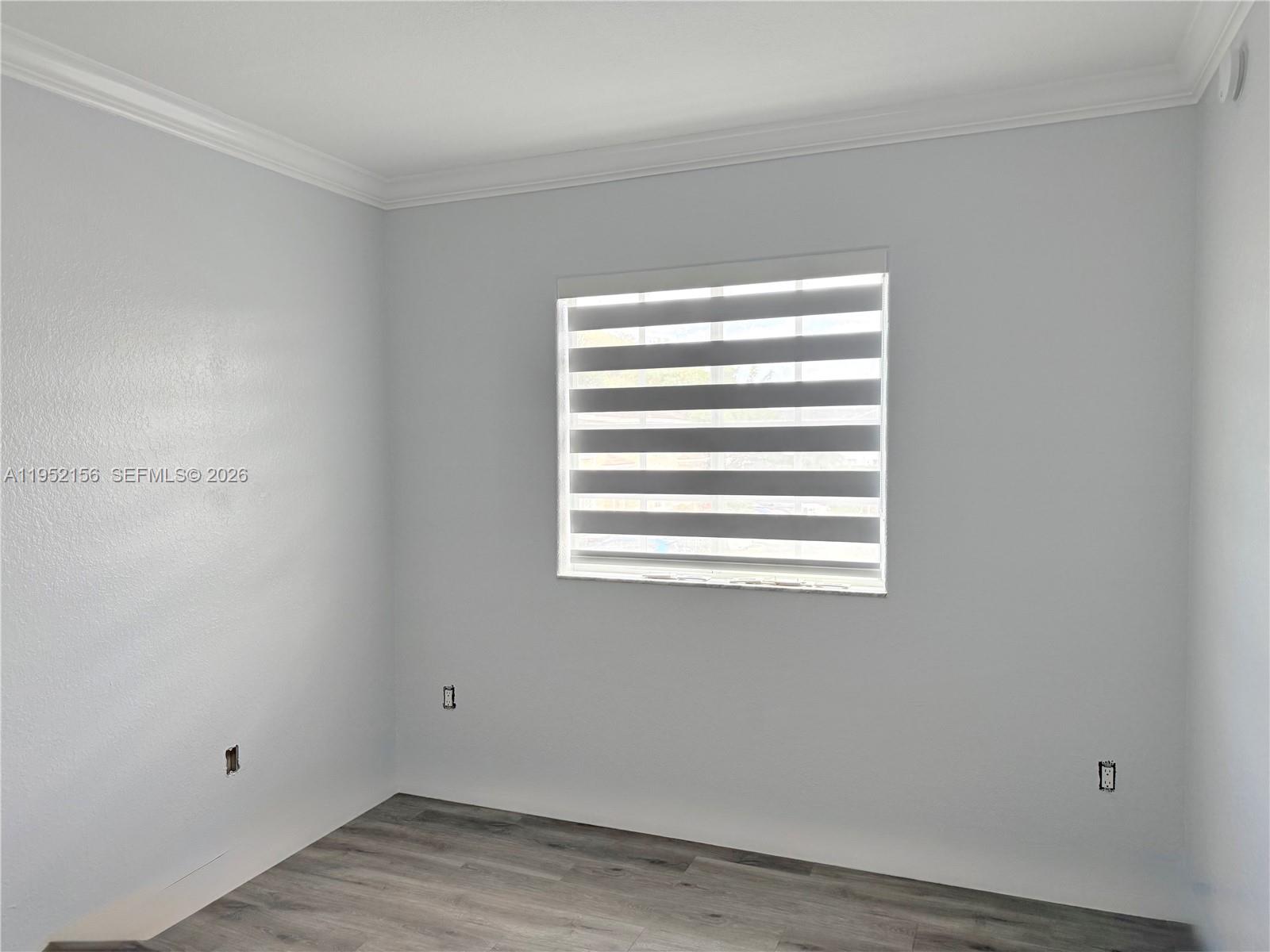 7330 Northwest 174th Terrace, Unit 204 Hialeah, FL 33015 - Photo 8 of 18 a view of a room that has a window