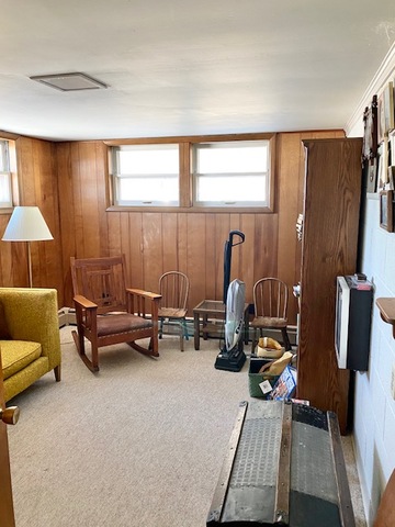 1820 Wolverine Road Dixon, IL 61021 - Photo 14 of 17 a living room with furniture a lamp and a window
