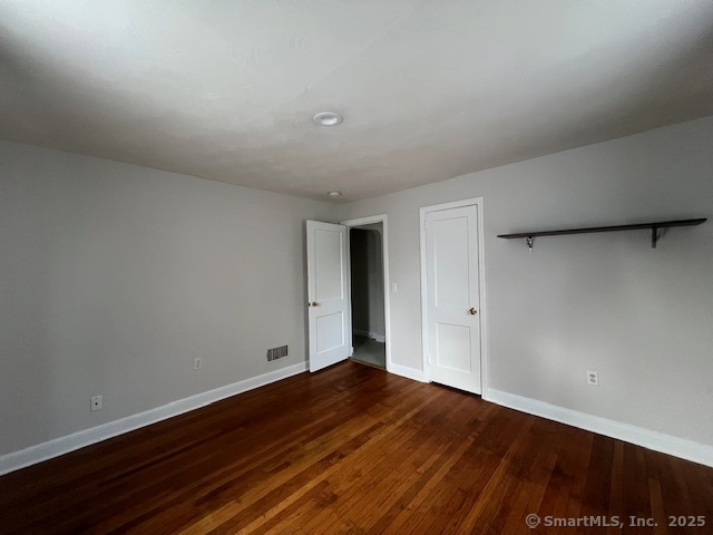 451 Meadow Street Fairfield, CT 06824 - Photo 5 of 9 a view of an empty room with wooden floor