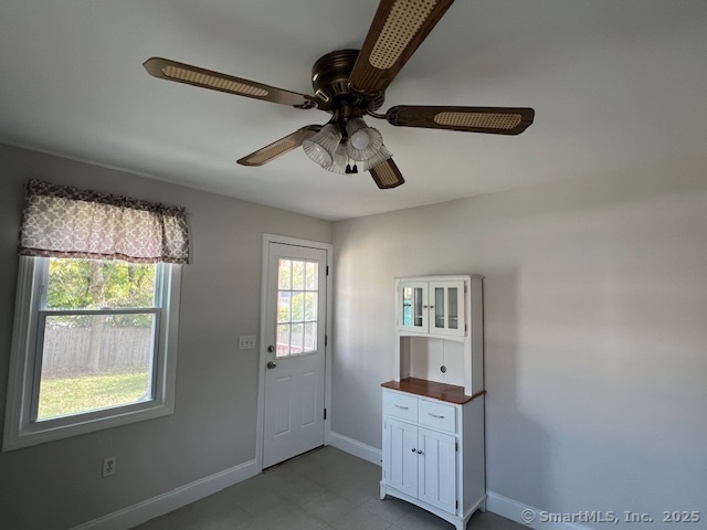451 Meadow Street Fairfield, CT 06824 - Photo 7 of 9 a view of room with hardwood floor and ceiling fan