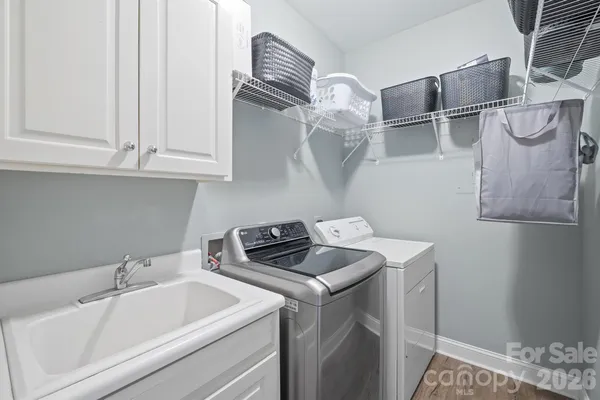 a utility room with dryer and washer